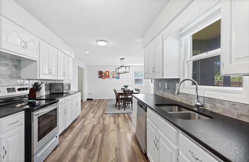 Joplin Maison | Stylish Rancher in Quiet, Tree Lined Neighborhood.
