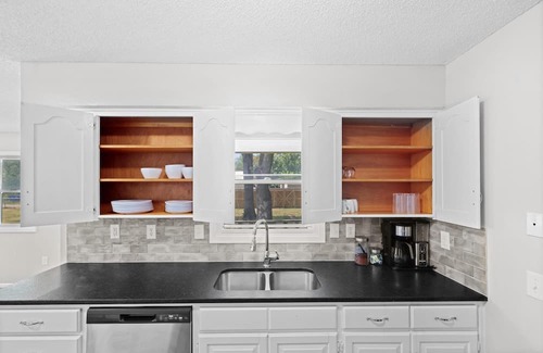 Joplin Maison | Stylish Rancher in Quiet, Tree Lined Neighborhood.