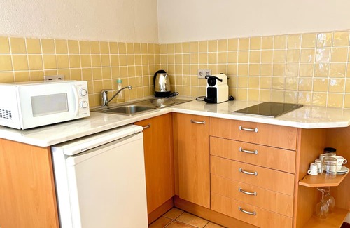 Ullastret Appartement | EL FORT DúLLASTRET, Apartment 2: Standard double room with kitchenette