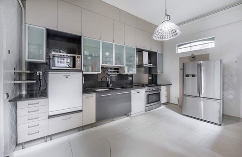 Arsenal Appartement | A Verdant Escape:580m2:Expansive Townhouse Nestled in a Marais Cul-de-Sac