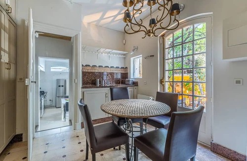 Arsenal Appartement | A Verdant Escape:580m2:Expansive Townhouse Nestled in a Marais Cul-de-Sac