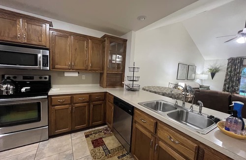 Spiro Maison | Upscale home with high end furnishings and memory foam king bed. 2 car garage