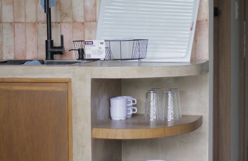 Americana Appartement | Minimalist terracotta