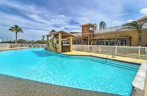 South Padre Island Copropriété | Coral Cave Luxury Condo! Enjoy the beach, pools, BBQs, and bay views.