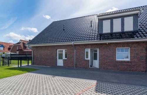 Westeraccumersiel Appartement | Experience happy times - live centrally, enjoy peace and quiet