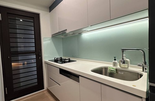 Tamsui Appartement | Spacious 3-bedroom apartment with WiFi, fitness room in New Taipei City