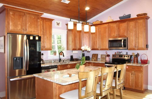 Coats Maison | Peaceful Studio Style Home with Accessible Features, Wood Burning Fireplace