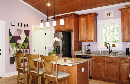 Coats Maison | Peaceful Studio Style Home with Accessible Features, Wood Burning Fireplace