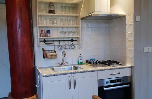 Oudeslius Maison | Have a unique experience in the Boerderijkamer with private outdoor hot tub , breathtaking views and comfortable amenities. Enjoy a carefree stay with fresh rolls and delicious coffee every day and explore the surrounding area, the beach, Callantsoog