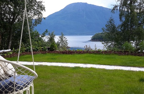Glomset Appartement | Peaceful countryside flat near Ålesund. Fjord & Mountain views, patio & garden