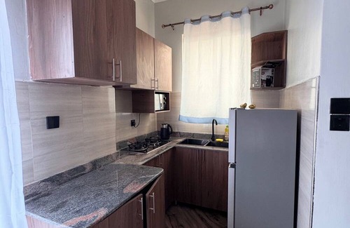 Kampala Appartement | Cozy 1-bedroom Studio apartment in charming Kampala with WiFi, AC and Netflix