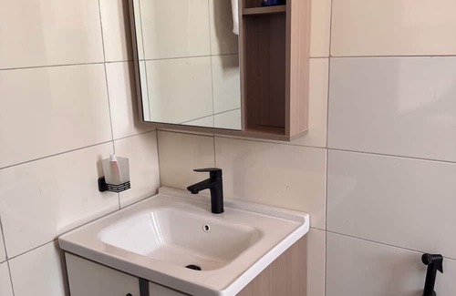 Kampala Appartement | Cozy 1-bedroom Studio apartment in charming Kampala with WiFi, AC and Netflix