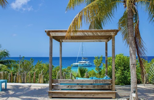 Sabadeco Maison | Crown Ridge 12 – Oceanfront home with private pool & infant of a dive site