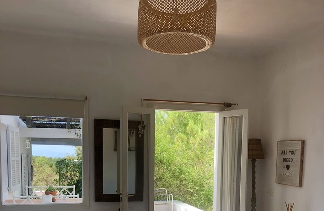 Formentera. Room immersed in the woods with sea view.
