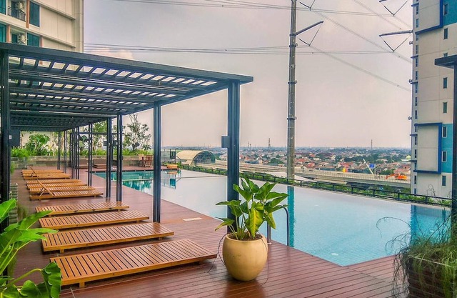 Wooden Touch Studio At Lrt City Bekasi Apartment
