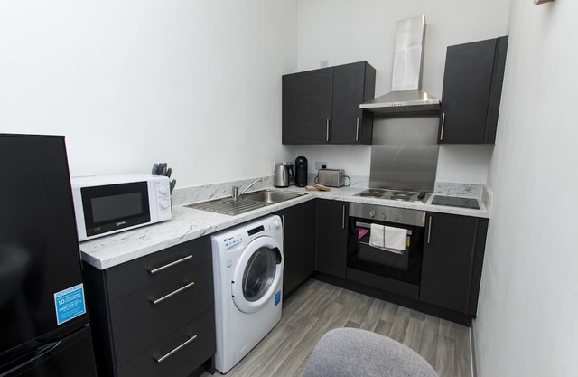 K Suites - Cozy 1 bed Apt w/free parking