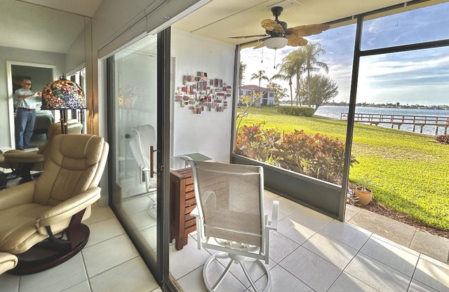 Waterfront condo with bay view, pool, patio, & W/D - calendar month rental