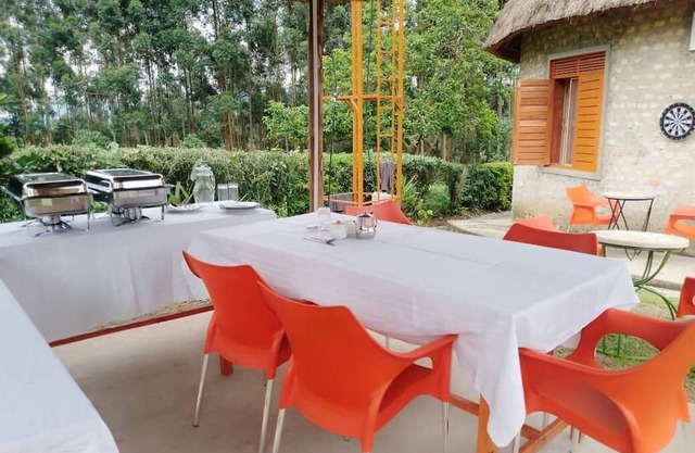 White Cat Farm Hut Inn is nestled on the outskirts of a quaint African village