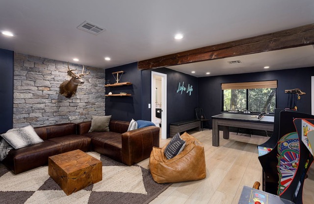 Pet-friendly lakefront cabin with private dock and game room