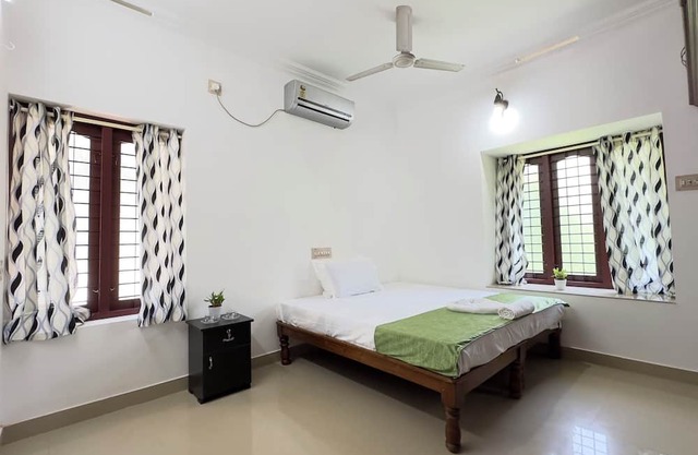 Halcyon Homes - Delightful 2-bedroom house with AC in Thiruvananthapuram
