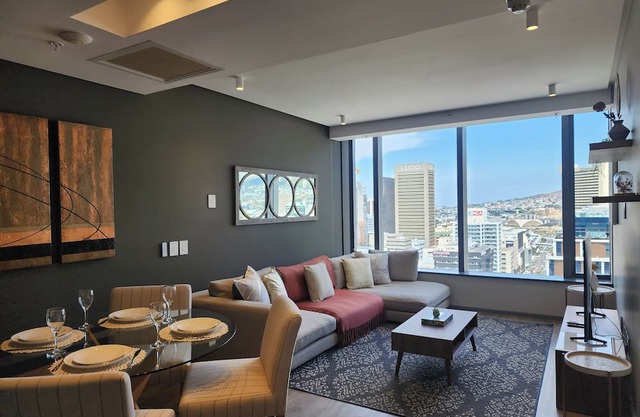 Stylish Duplex with Mountain and City Views