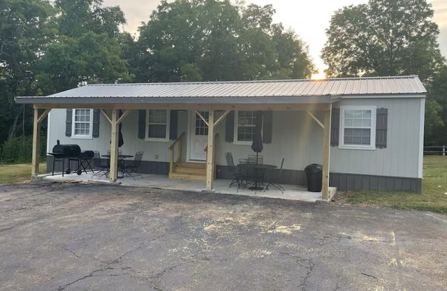Enjoyable 2-bedroom house on 24 acres right on Black River.