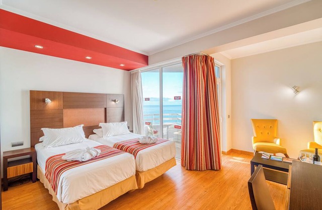 Proximity At Its Best! Swimming Pool, Parking, Sea View, and Kitchenette