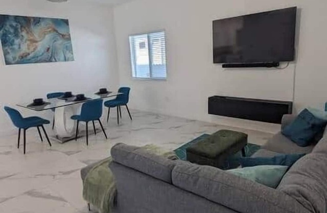 Modern style house, boasting a single-story layout . 3 minutes from downtown!