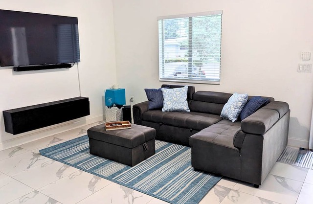 Modern style house, boasting a single-story layout . 3 minutes from downtown!