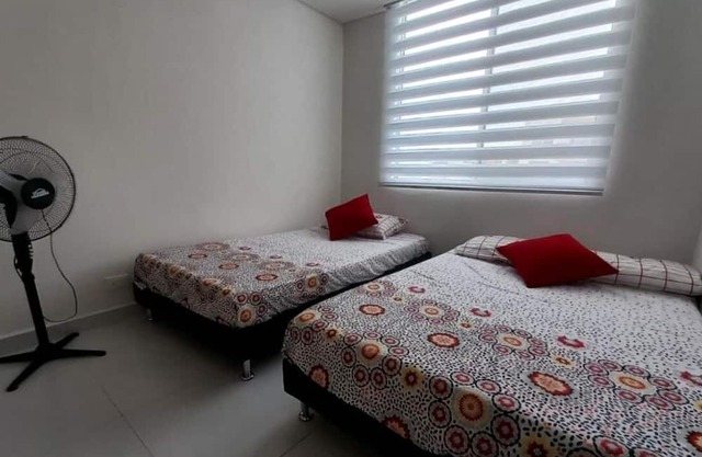 Charming 2-bedroom apartment in lovely Girardot with WiFi, fitness room