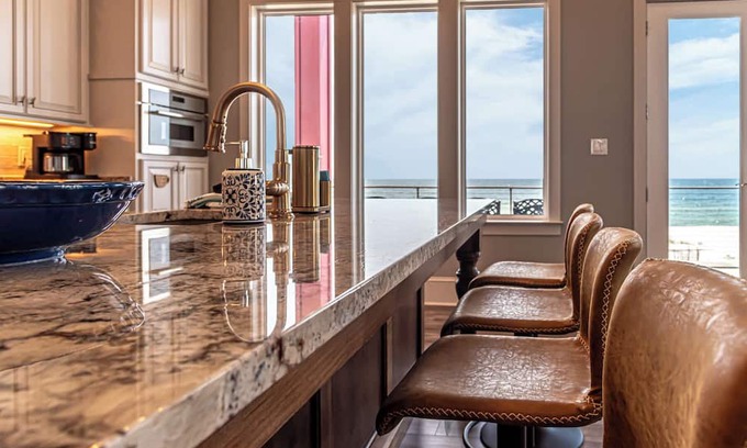 Fort Morgan Maison | Postcard views from your home equipped with a dream kitchen! Come enjoy luxurious living in a highly sought-after neighborhood in Fort Morgan.