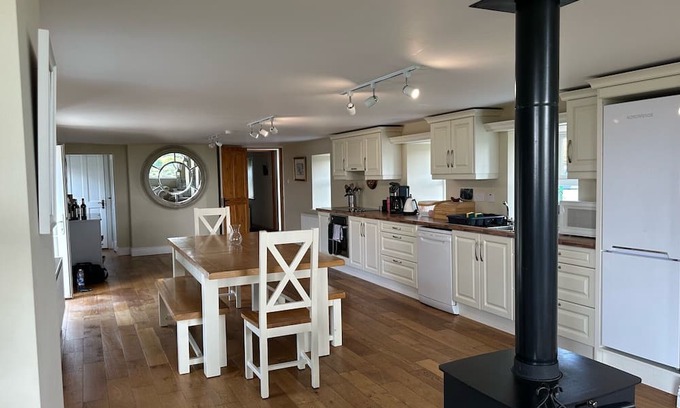 Hook Head Maison | Gorgeous renovated farmhouse with sweeping views of lush farmland!