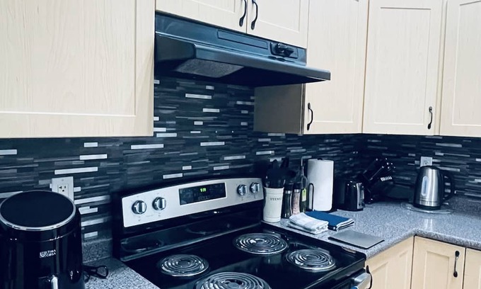 Slave Lake Maison | Modern Upper Level Duplex House Beside Convenience Store and Gasoline Station