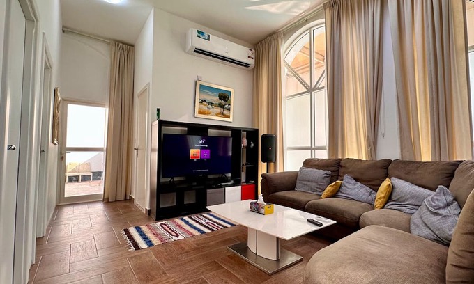 Doha Appartement | Heart of Doha Elegant Home with Shared Swimming Pool
