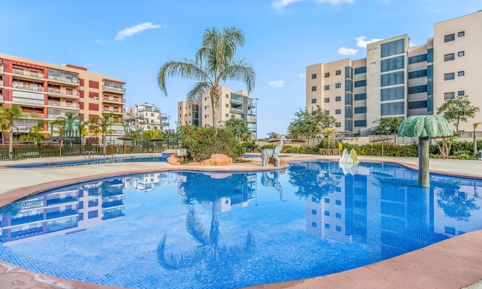 Mil Palmeras Appartement | Apartment 'Gran Terraza Vistas Mar' with Shared Pool, Wi-Fi and Air Conditioning