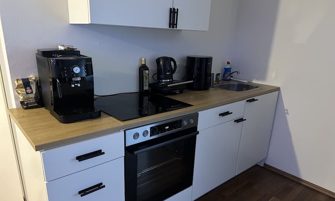 Sossenheim Appartement | 2-Zimmer Wohnung mit Gym + Office