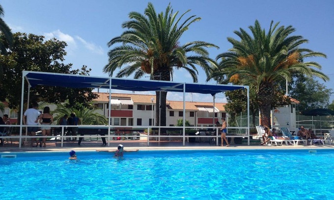 Falerna Appartement | Holiday Apartment "Villa Patrizia - Residence La Giungla" with Sea View, Shared Pool & Wi-Fi