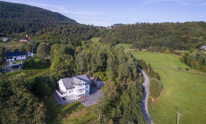 Glomset Appartement | Peaceful countryside flat near Ålesund. Fjord & Mountain views, patio & garden