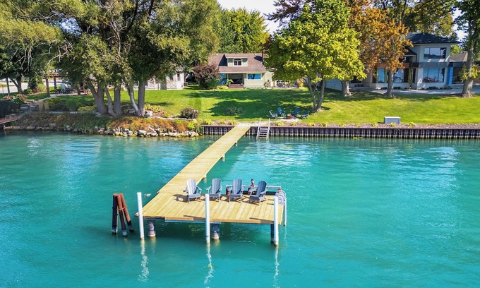 Sombra Maison | Ivy Cottage River Retreat Relax on the dock and watch the ships go by!